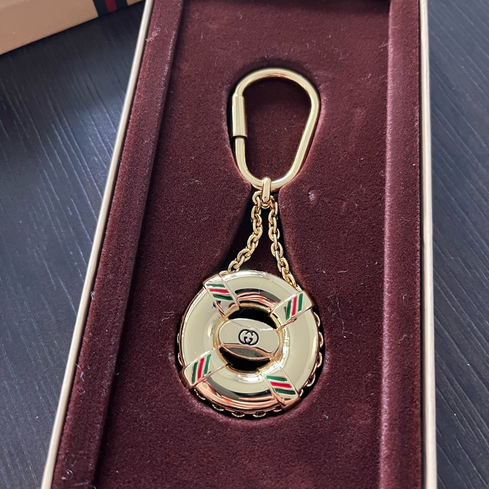 Gucci gold life preserver key chain